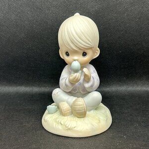 Precious Moments “I believe in miracles” figurine